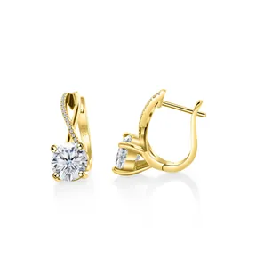 Detailed view of S925 sterling silver earrings with 18K gold twist and moissanite stones