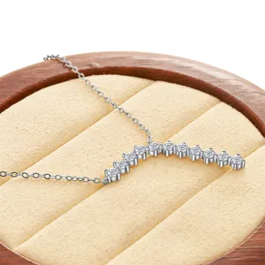 925 sterling silver necklace featuring curved moissanite pendant on a fine silver chain