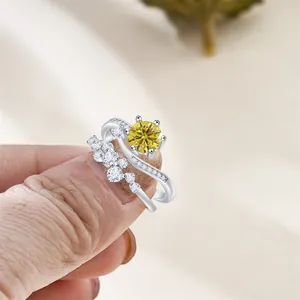 Macro detail of S925 hallmark on silver ring featuring a yellow moissanite stone