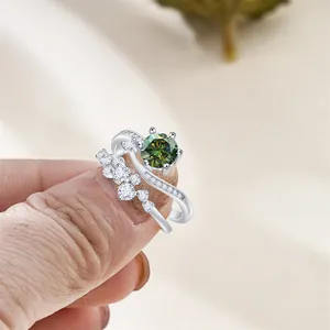 Detail of S925 silver stamp on a green moissanite bridal set with six-prong setting