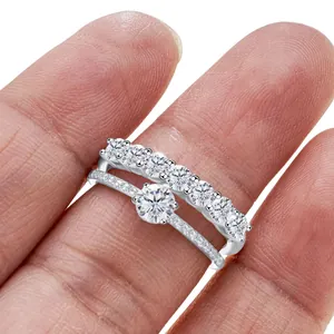 Elegant silver sparkling seven-stone eternity ring and round diamond bridal set for women