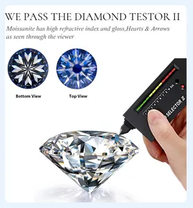 Detail van moissaniet diamant met hart- en pijlsnede en diamanttester voor kwaliteit