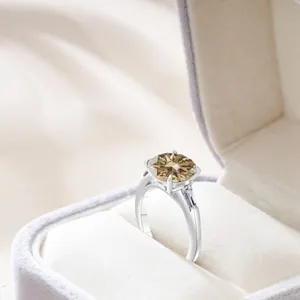 Luxury sterling silver ring with 5ct pear cut champagne moissanite and baguette side stones