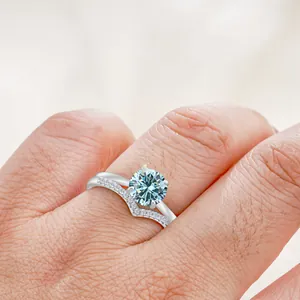 Sparkling S925 sterling silver moissanite ring set with a large blue gemstone for women