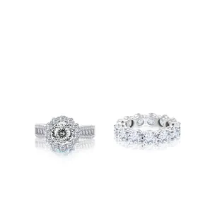 Close-up of 7.2ct moissanite halo ring and eternity band with S925 silver stamp