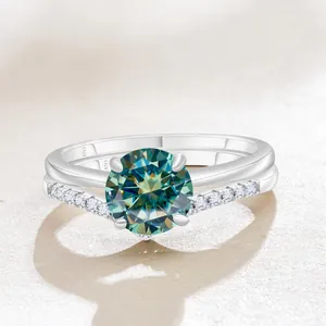 Macro detail of S925 silver ring featuring a sparkling blue moissanite and 6-prong setting