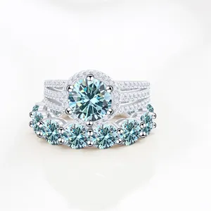 Luxury S925 silver moissanite ring set featuring a light blue gemstone and halo accents
