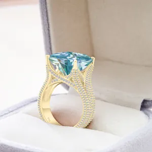 Detail of square blue stone ring in gold plated silver with s925 stamp on band
