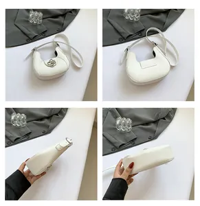 Detail views of white PU leather hobo bag with a floral metallic buckle closure