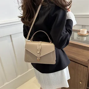 Elegant khaki small square crossbody bag with gold buckle and top handle for women