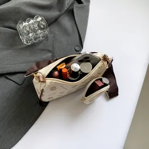 Detailed capacity display of vintage printed crossbody bag set with small round coin purse