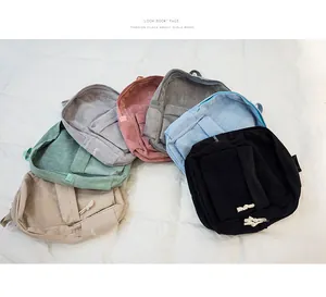 Detailed view of corduroy backpack variety in soft Morandi colors with striped texture
