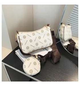 Beige vintage floral monogram crossbody bag with small round pouch and brown strap