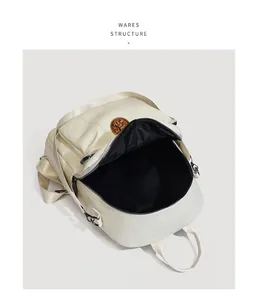 Detailed top view of cream large capacity backpack with textured finish and black lining