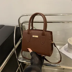 Deep brown stone pattern tote bag with golden hardware and double top handles for women