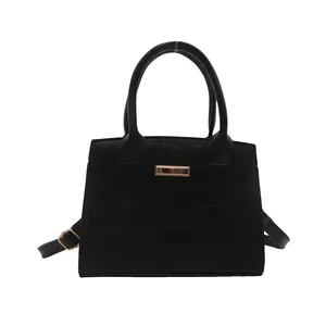 Classic black crocodile pattern handbag for women with gold hardware and shoulder strap