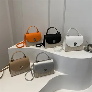 Fashionable woven straw crossbody bags with metal locks in five vibrant colors