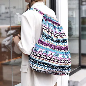 Close-up of ethnic drawstring backpack with geometric stripes and large capacity storage