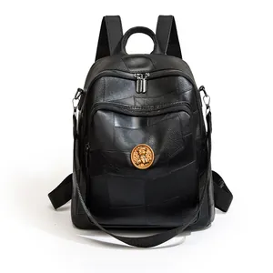 Large black leather backpack for women with teddy bear emblem and adjustable straps