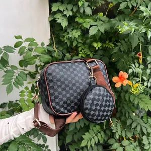 Retro crossbody camera bag with geometric pattern, wide strap and round coin purse detail