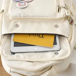 Detail view of large capacity canvas backpack interior with tablet and notebook pocket
