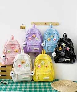 Close-up of high-capacity Japanese student backpacks in five pastel colors with bubble texture