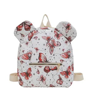 Mochila blanca con estampado de mariposa roja y orejas redondas para niñas