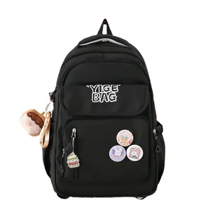 Black large capacity student backpack with cute badges and YIGE BAG logo print