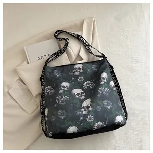 Detail of nylon crossbody bag with skull floral print and LOVE lettered strap