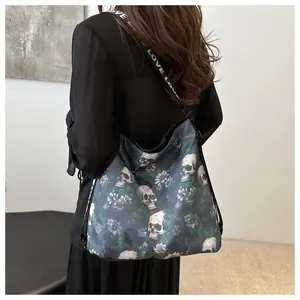 Detail of nylon crossbody bag with skull floral print and LOVE lettered strap