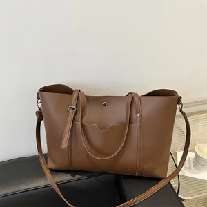 Brown soft leather tote bag with large capacity and detachable strap for casual daily use