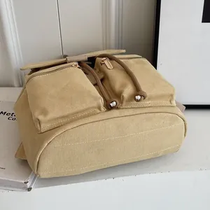Mochila retro de lona caqui con cordón y solapa para uso diario casual y actividades