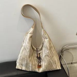 Elegant bamboo leaf pattern hobo bag with champagne pleated texture and leather strap