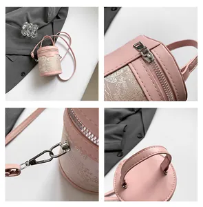 Detailed views of pink bucket bag showing zipper, metal hooks and jacquard fabric texture