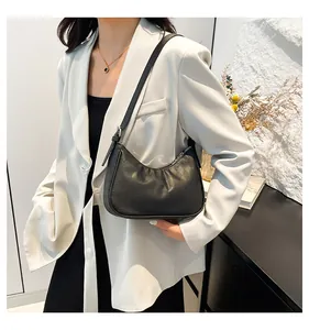 Black hobo bag with checkerboard embossed texture and sleek crescent shape design