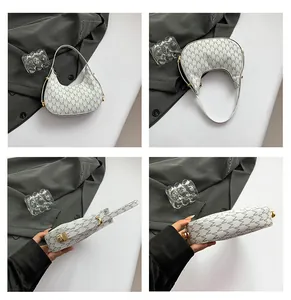 Macro views of white hobo bag with grey M-letter pattern and golden hardware