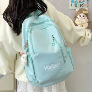 HOKEAM light blue waterproof school backpack with cute white plush bear keychain