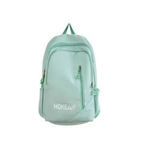 Waterproof mint green backpack with double compartments and HOKEAM logo for students
