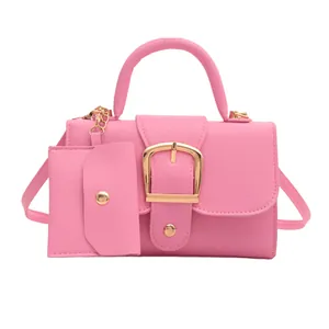 Pink lychee texture handbag with gold buckle and mini pouch accessory