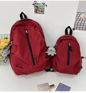 Dunkelrotes Nylon-Rucksack-Set mit vertikalem Reißverschluss und Oktopus-Plüschanhänger
