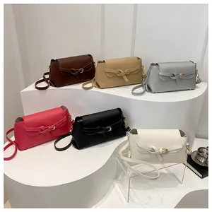 Minimalist square crossbody bags in six colors with a stylish knotted leather buckle detail