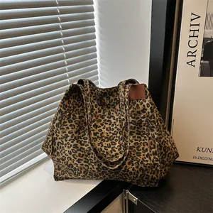 Stylish large capacity leopard print canvas tote bag for women with dual top handles
