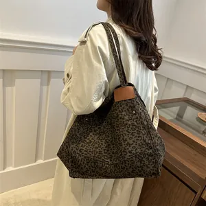 Large leopard print canvas tote bag for women with leather trim and metal rivets