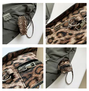 Macro detail of leopard print PU leather coffin bag showing silver rivets and metal zipper