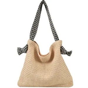 Minimalist straw tote bag for women with houndstooth bow straps for summer beach vacations