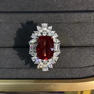 Exquisite silver ring with 10 carat red synthetic ruby and white gemstone floral halo