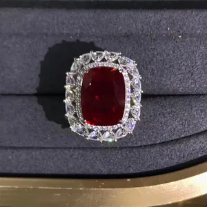 Luxury S925 silver ring with 10ct cushion-cut ruby and diamond halo on velvet base