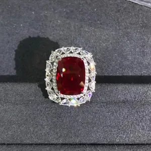 Macro view of 10-carat cushion-cut ruby ring with double halo diamond setting in S925 silver