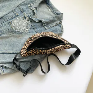 Casual leopard print nylon chest bag with adjustable black strap on denim jacket