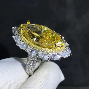 Luxury 10-carat marquise cut yellow stone ring with double halo and full pavé band